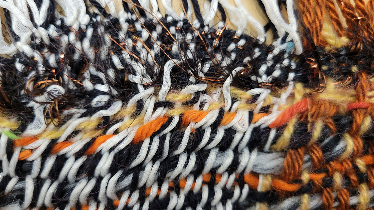 Twisted warp threads